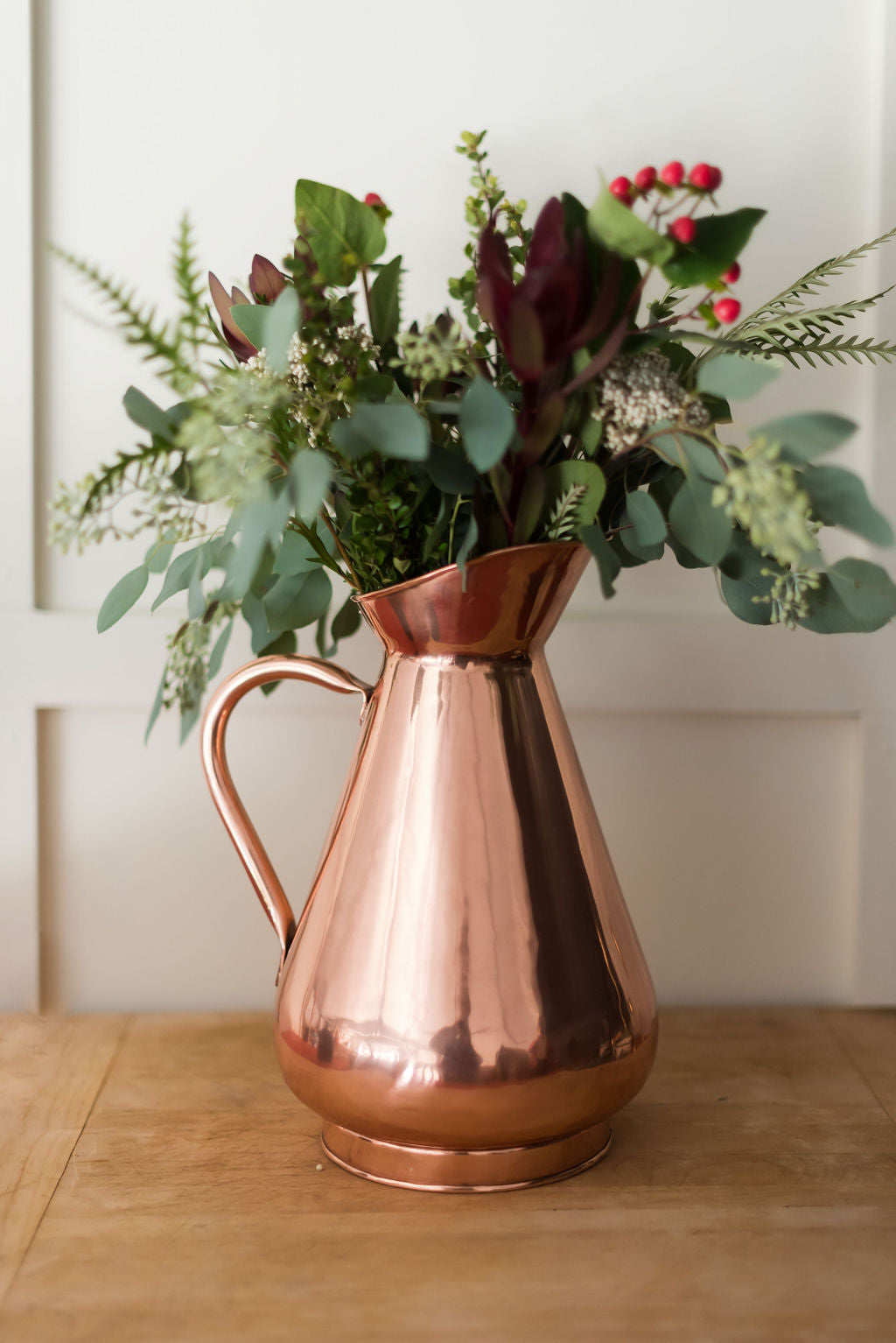 Galley & Fen copper heirloom vase with greenery and berries