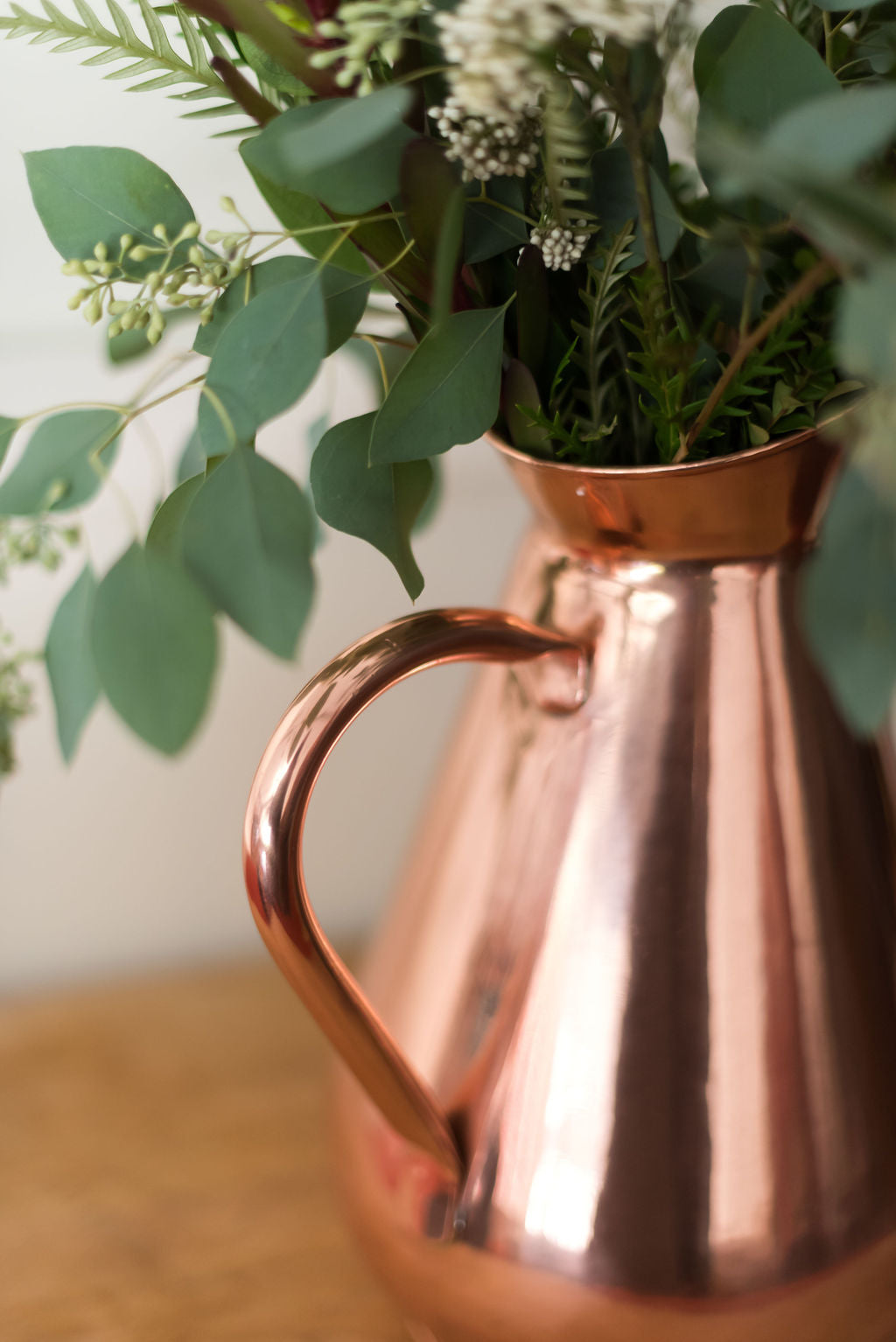 Galley & Fen copper heirloom vase with eucalyptus, close-up