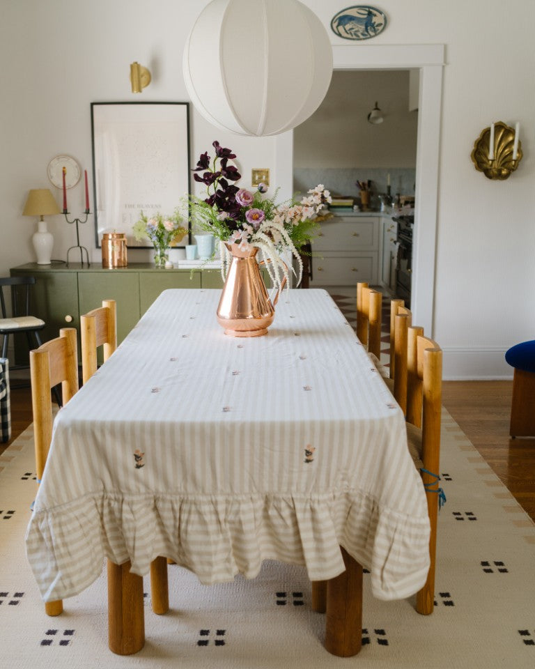 Galley & Fen copper heirloom vase on a long dining table