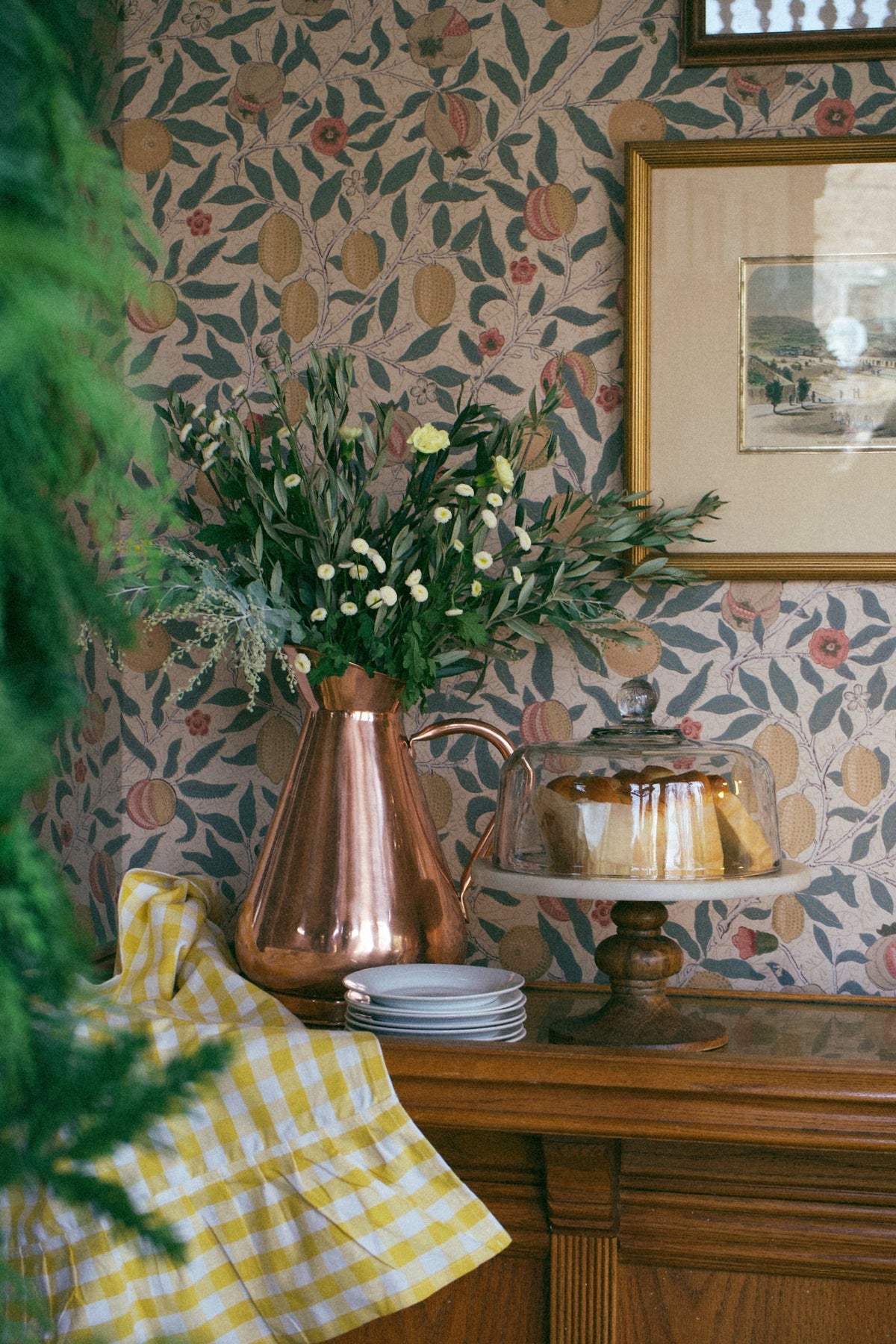 Galley & Fen copper heirloom vase with white flowers on a sideboard