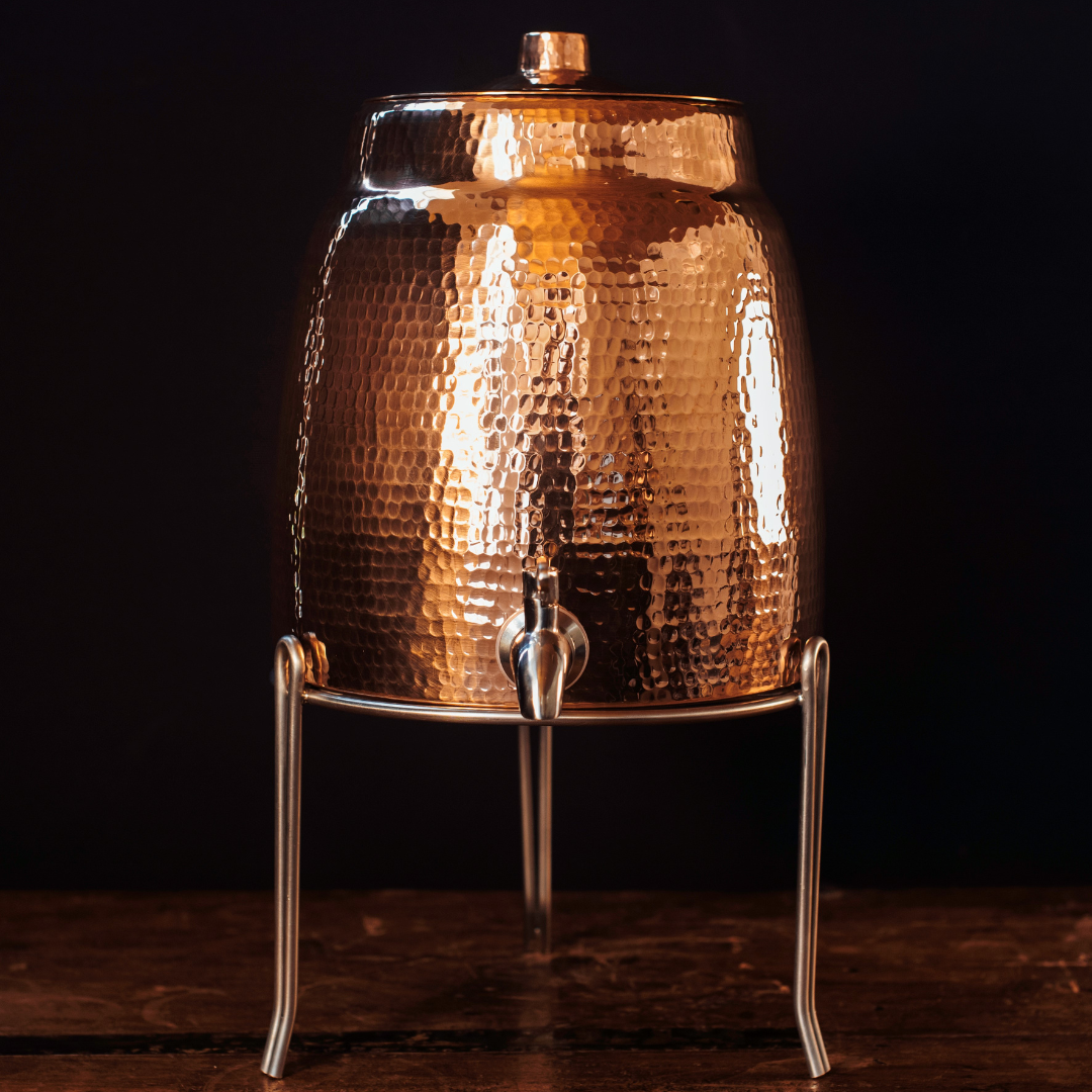 Sertodo Niagara copper water dispenser on a metal stand