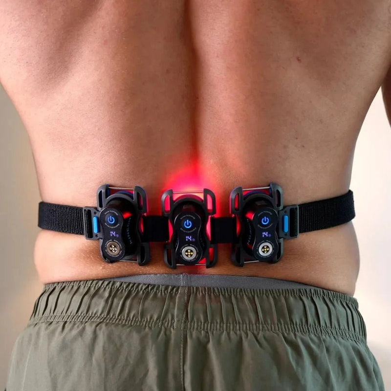 Kineon The MOVE+ worn across the lower back, glowing red