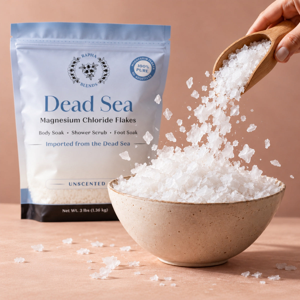 Rapha Blends Dead Sea magnesium flakes bag beside a ceramic bowl being filled