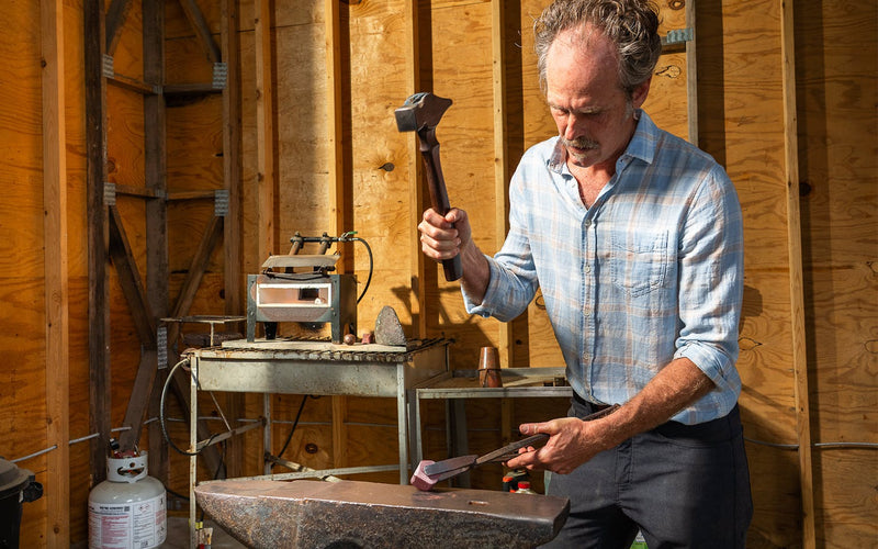 Sertodo artisan working copper at the forge