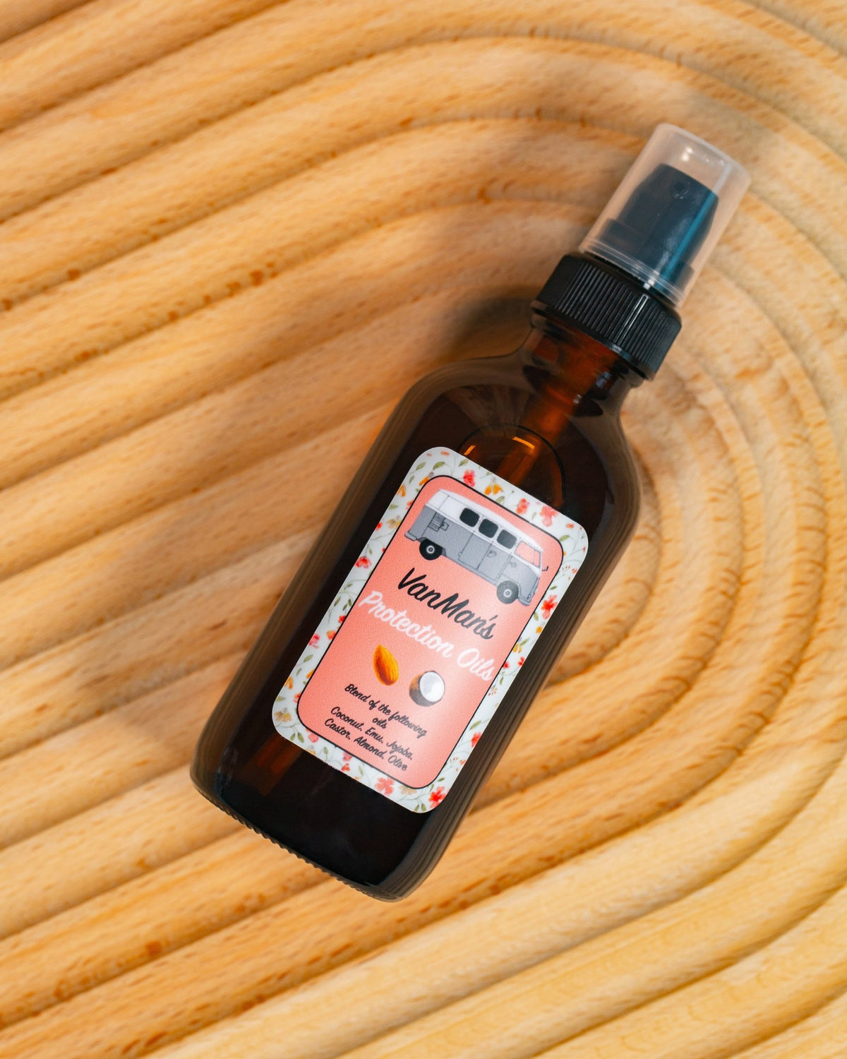 VanMan's Protection Oils Hair Serum bottle on a wooden tray