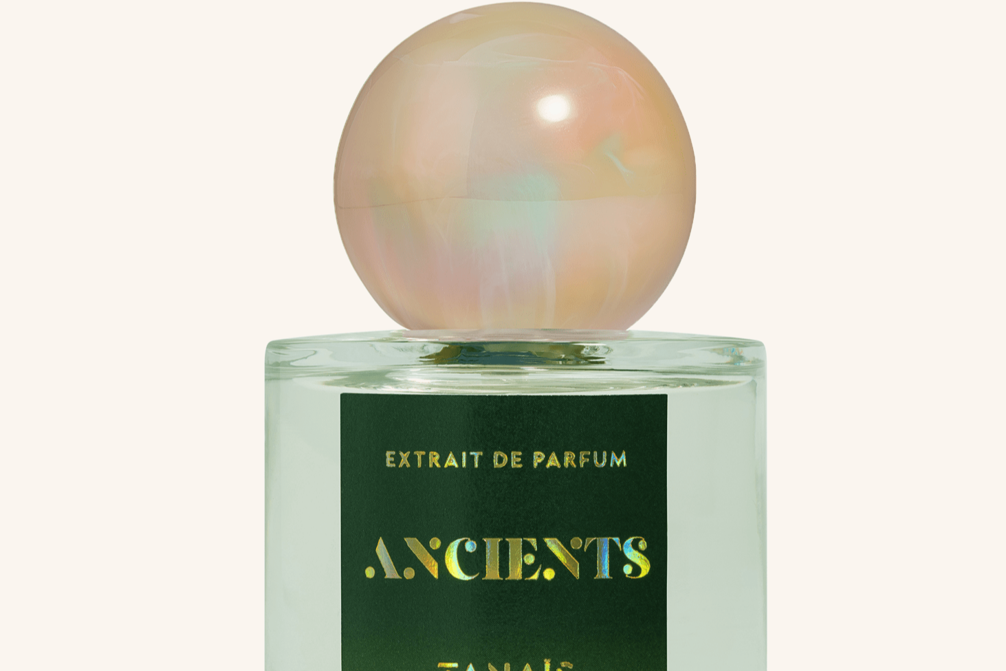 Perfume bottle with a colorful cap on a white background