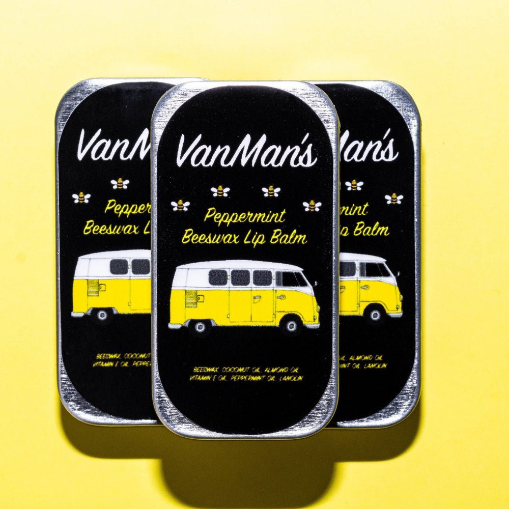 VanMan's Peppermint Beeswax Lip Balm, three tins on a yellow background